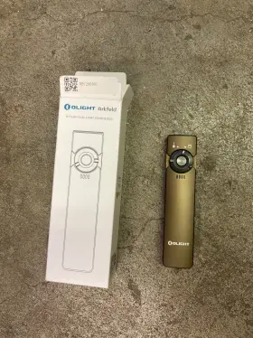 Olight 972378127648 Arkfeld Flashlight Brown Fde Green Laser/white Light. Missing Charger Olight 972378127648 Arkfeld Flashlight Brown Fde Green Laser/white Light. Missing Charger