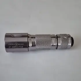 Surefire A55587 E1 Executive Handheld Flashlight Silver Metal