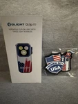 Olight Oclip Pro Stars & Stripes Edition Flashlight With Memorial Day Patch. Fixed Price $35.00.
