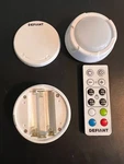 Defiant Battery Operated Color Changing Led White Puck Light W/remote, Pack Of 6. Fixed Price $15.00.